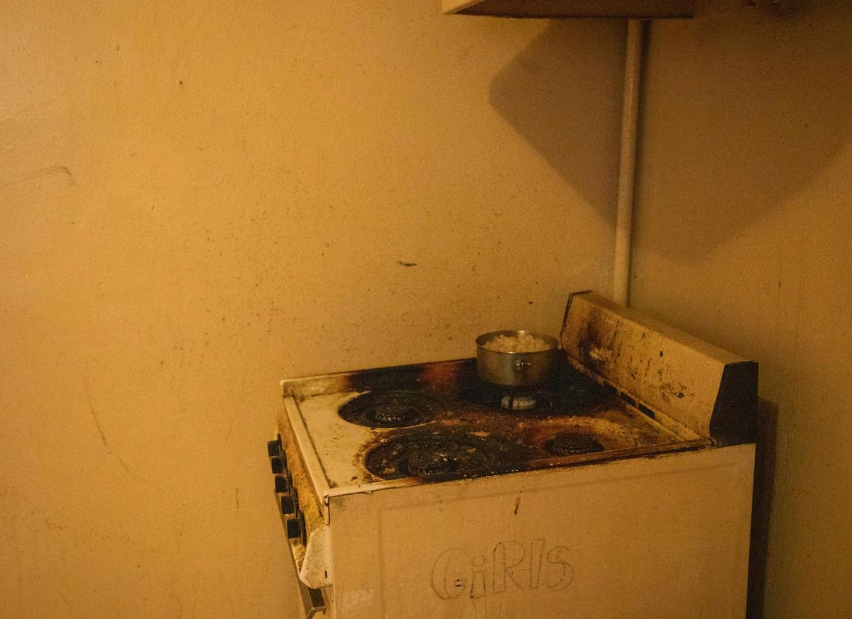 Macaroni noodles boil on the stove that Brittany Brown, 28, believes to be leaking carbon monoxide and the cause of her infant son Britain’s death on Dec. 8, 2019, in Brown’s apartment at McDougald Terrace, on Friday, Jan. 3, 2020, in Durham, N.C.