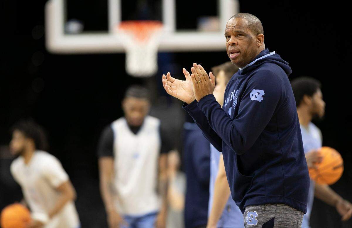 North Carolina coach Hubert Davis encourages his players during the Tar Heels open practice on Thursday, March 24, 2022 at Wells Fargo Center in Philadelphia, Pa.