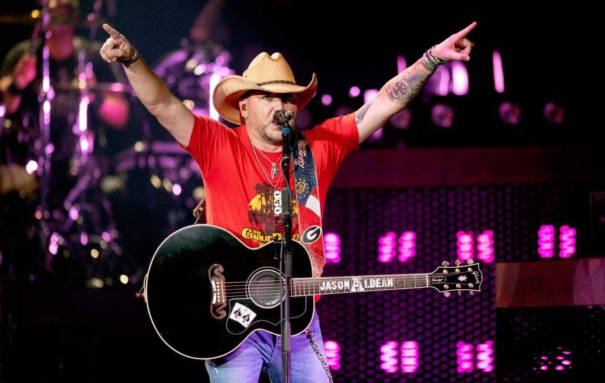 Jason Aldean acknowledges the crowd during his concert at Raleigh, N.C.’s Coastal Credit Union Music Park at Walnut Creek, Friday night, Aug. 11, 2023.