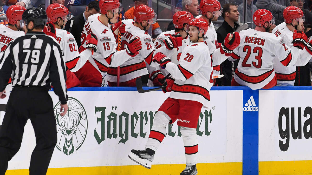 Carolina Hurricanes center Sebastian Aho (20) celebrates his goal against the New York Islanders with the Carolina Hurricanes bench during the second period in game four of the first round of the 2023 Stanley Cup Playoffs at UBS Arena.