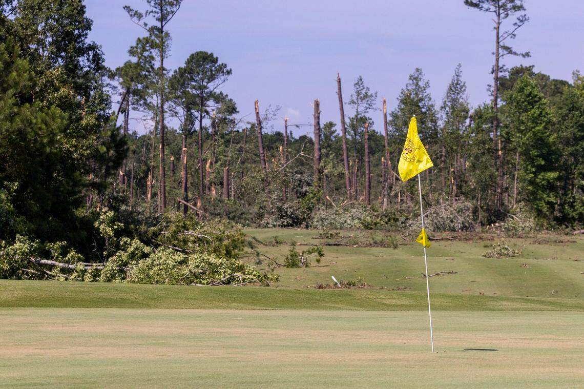Downed trees show the path of a tornado in the Belmont Lakes Country Club community in Rocky Mount Thursday, July 20, 2023. An EF3, tornado with wind speeds of 150 mph touched down in Nash County Wednesday around 12:30 p.m. Wednesday according to the Raleigh National Weather Service..