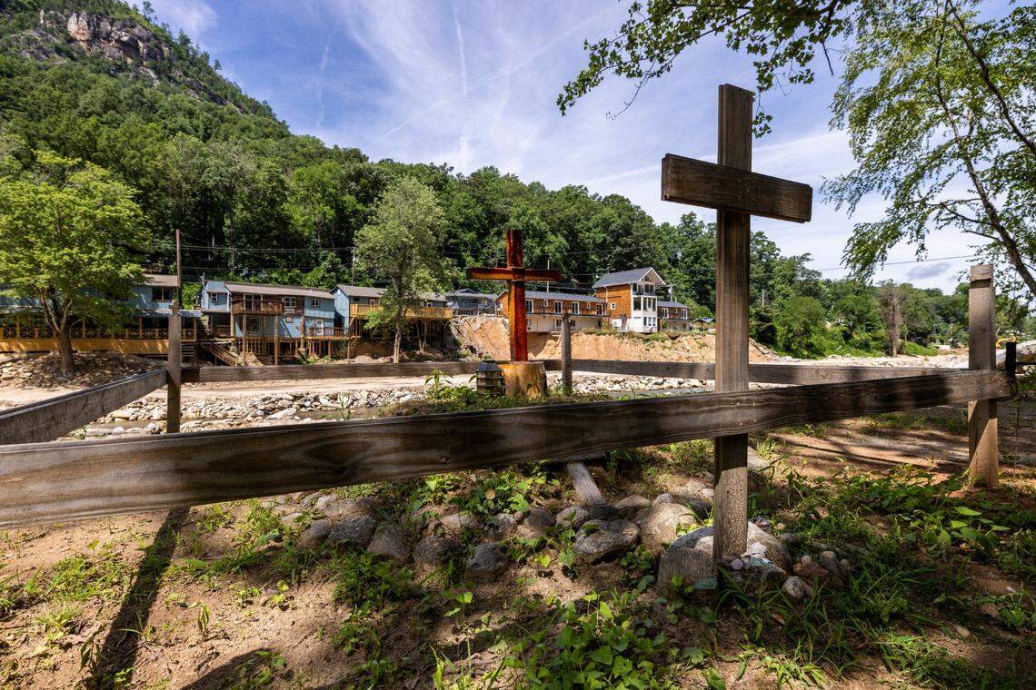 A makeshift memorial sits along the Broad River where a home once stood on Friday, June 13, 2025, in Chimney Rock, after Hurricane Helene devastated the area.