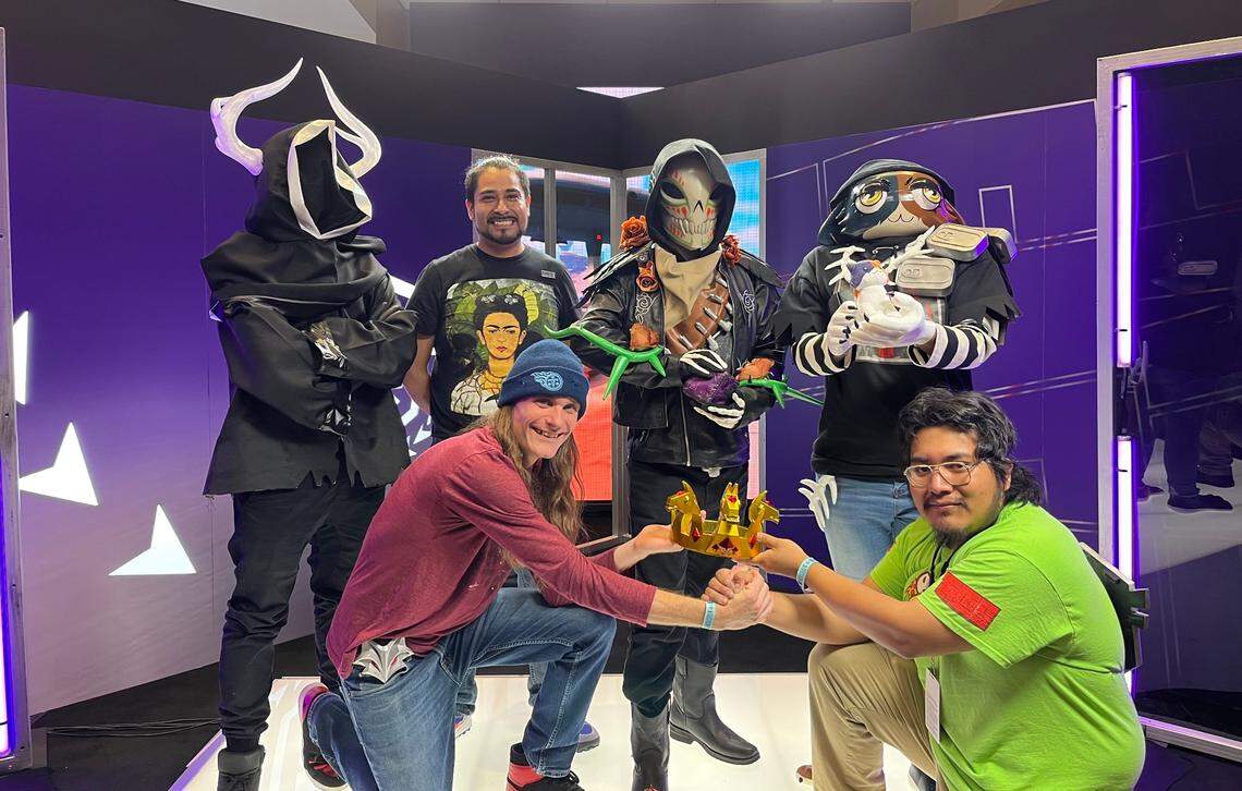Fortnite cosplayers Ramiro Martinez and Steve McCoy, along with their friends, at the Fortnite Champion Series Invitational tournament in Raleigh, N.C. on Saturday, Nov. 12, 2022.