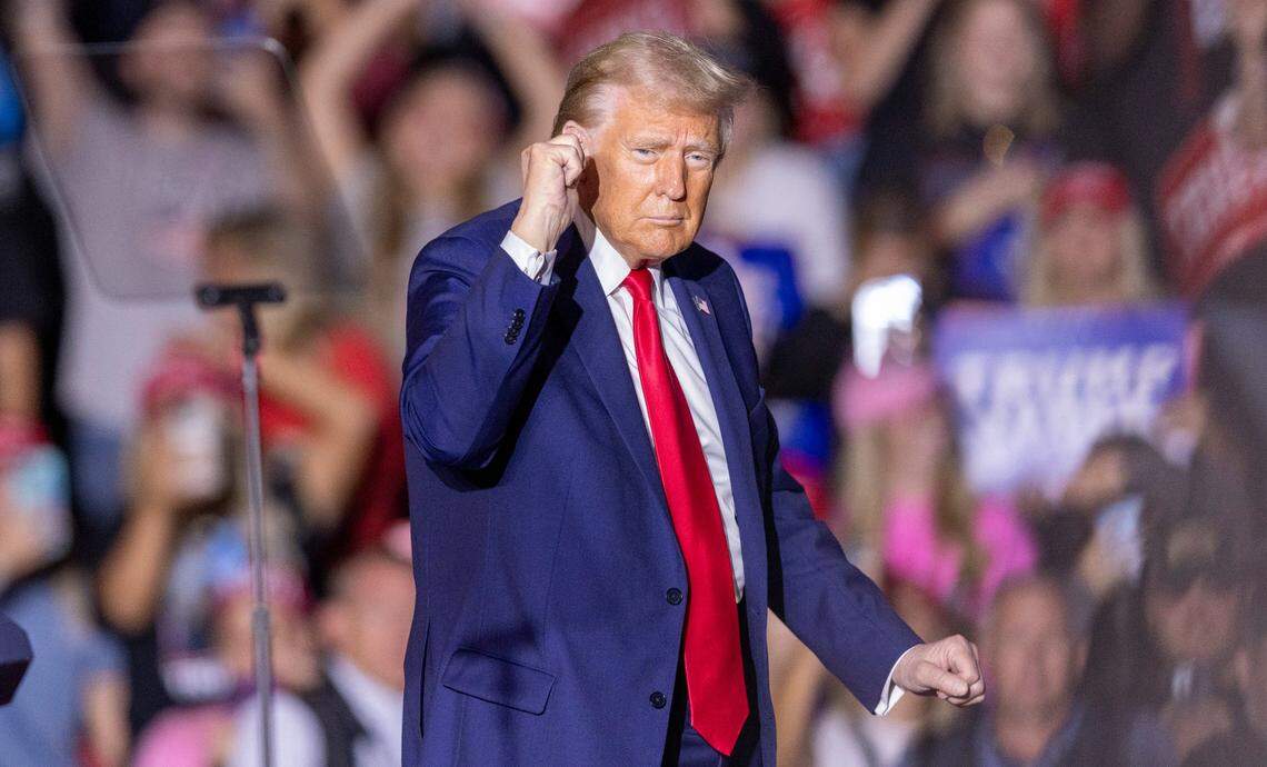 Former President Donald Trump dances while leaving the stage following a rally speech at Minges Coliseum in Greenville on Monday, Oct. 21, 2024. With two weeks until Election Day, Trump went on a three-city tour, in which Trump will also see the destruction caused by Hurricane Helene in Asheville and speak at a faith conference in Concord.