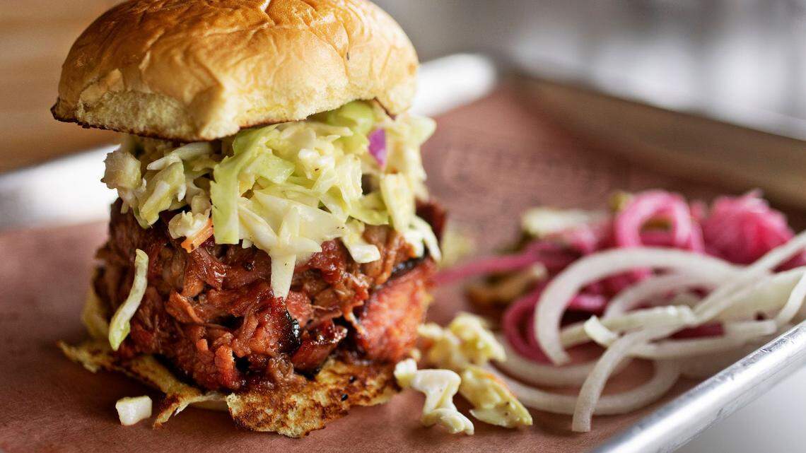 Prime Barbecue in Knightdale, NC, serves a variety of smoked meat sandwiches including the pork topped with slaw.