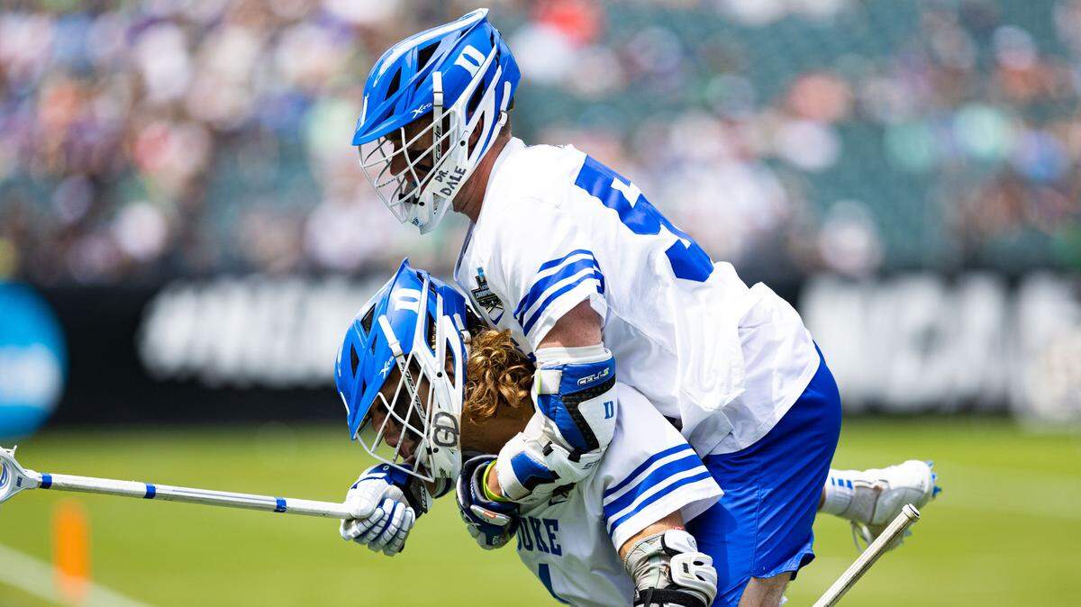 Duke Blue Devils midfielder Garrett Leadmon (1) celebrates with attack Dyson Williams (51) after scoring against the Notre Dame Fighting Irish during the third quarter at Lincoln Financial.