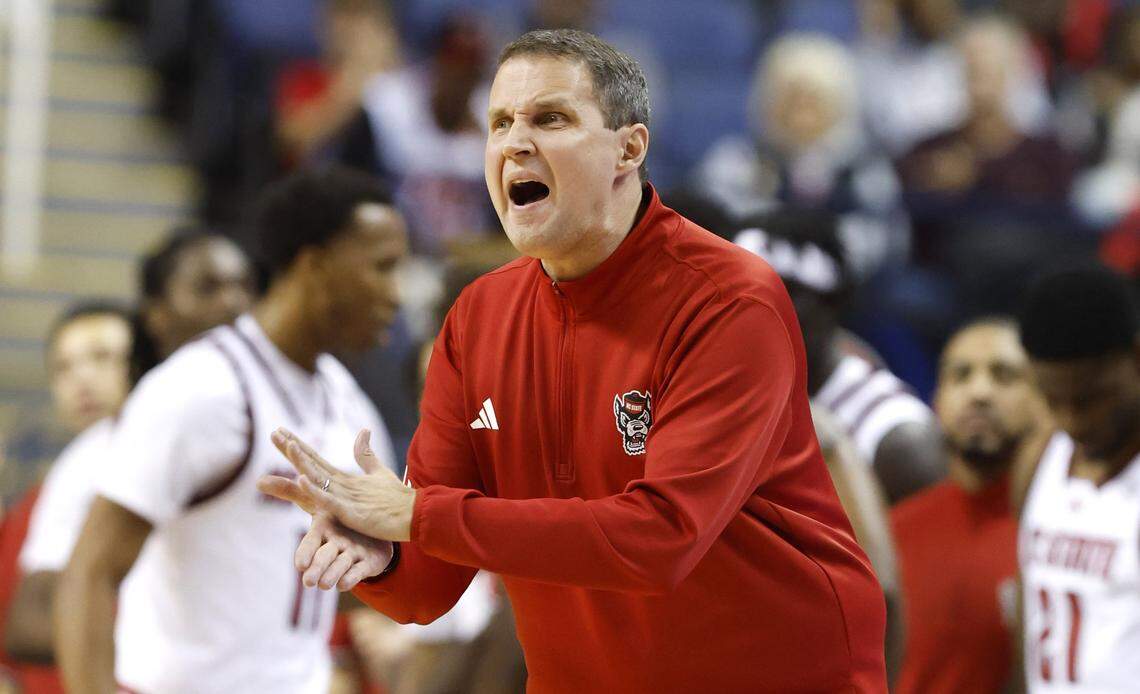 N.C. State head coach Will Wade encourages his players during the first half of N.C. State’s exhibition game against South Carolina at the First Horizon Coliseum in Greensboro, N.C., Sunday Oct. 26, 2025.