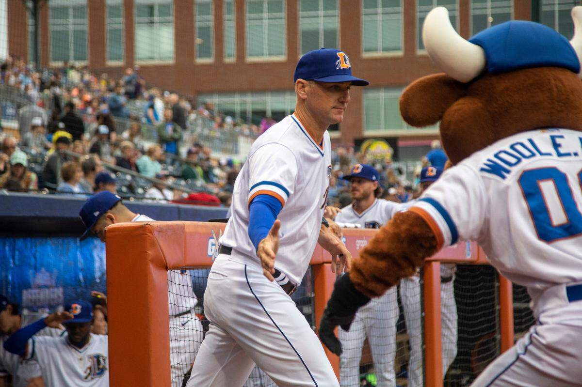 Durham Bulls’ new manager Michael Johns is introduced during the Bulls’ season opener against the Norfolk Tides, Friday March 31, 2023 at the Durham Bulls Athletic Park.