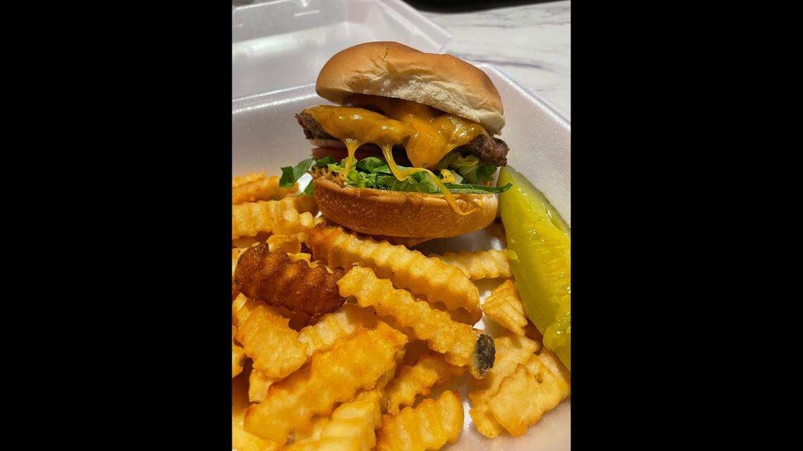 A cheeseburger with fries at Premier Cakes Diner at the NC Museum of History in downtown Raleigh.