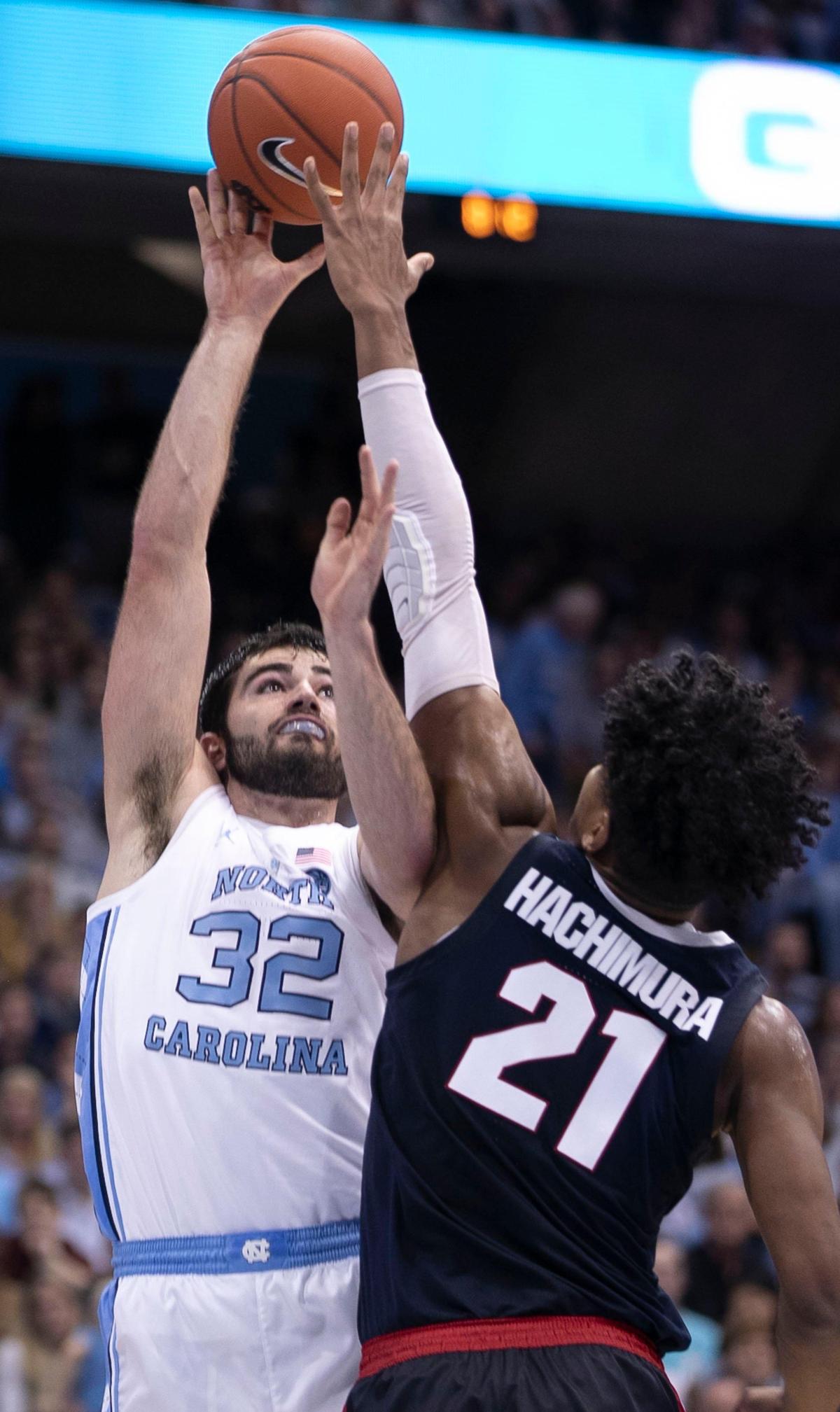 North Carolina’s Luke Maye (32) puts up a shot over Gonzaga’s Rui Hachimura (21) during the second half on Saturday, December 15, 2018 at the Smith Center in Chapel Hill, N.C. Maye scored 20 point in the Tar Heels win over Gonzaga.