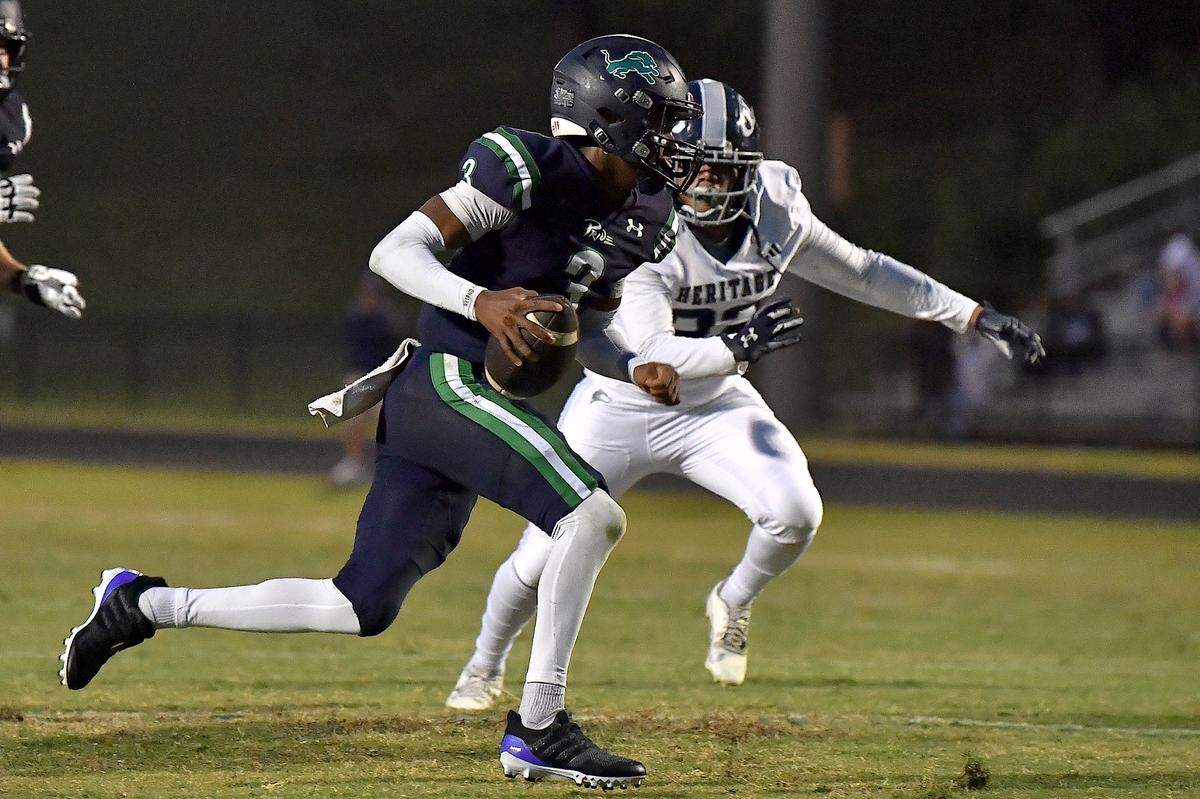Leesville Road quarterback Damacio Cueto (3) runs for the touchdown against Heritage during the first half.  The Leesville Road Pride and the Heritage Huskies met in a  football game in Raleigh, N.C. on September 5, 2025. 