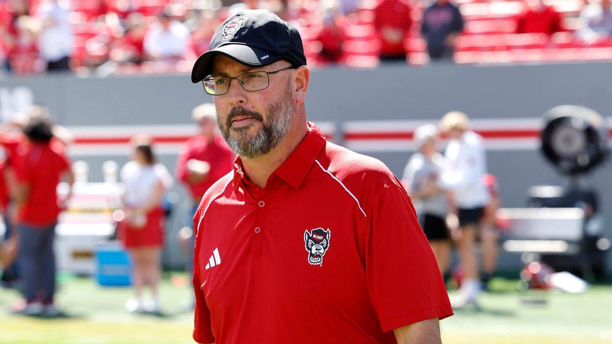N.C. State quarterbacks coach Kurt Roper walks the field during warmups before the Wolfpack’s game against Marshall at Carter-Finley Stadium in Raleigh, N.C., Saturday, Oct. 7, 2023.