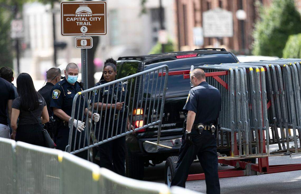 The North Carolina State Capitol Police install bicycle barriers around the perimeter of the State Capitol Building on Friday, June 12, 2020 in Raleigh, N.C.