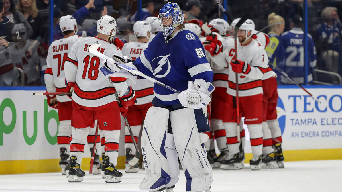 Tampa Bay Lightning’s Andrei Vasilevskiy (88), of Russia, reacts after giving up the overtime winning goal to the Carolina Hurricanes during an NHL hockey game Tuesday, Nov. 9, 2021, in Tampa, Fla. The Hurricanes won 2-1. (AP Photo/Mike Carlson)