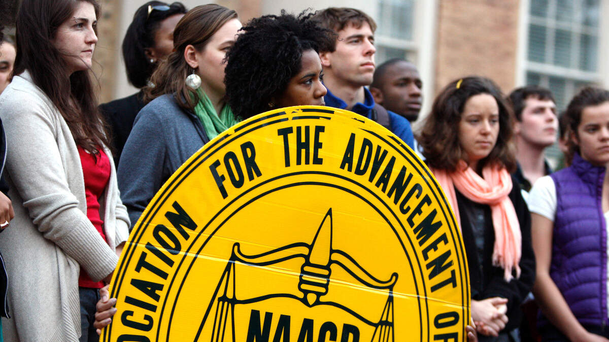A group of students and the North Carolina NAACP protested possible tuition hikes Feb. 1, 2012, on UNC-Chapel Hill’s campus. For over 80 years, the group has remained a prominent force in issues of racism in public schools, politics, legislation and voting rights.
