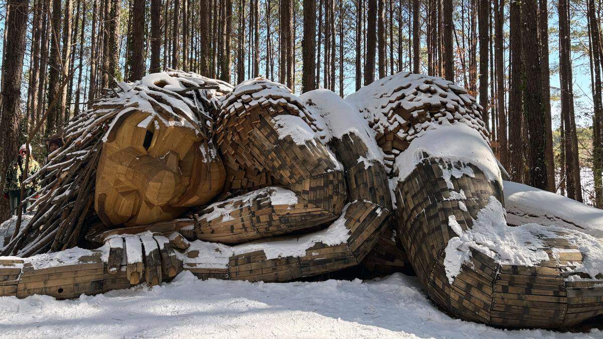 Snow coats Dix Park troll Mother Strong Tail, Sunday, Feb. 1, 2026.