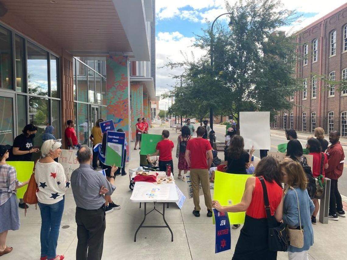 Protesters and counter-protesters gathered outside Google’s downtown Durham, NC, office Thursday, Sept. 8, 2022, to voice their views on the tech giant’s cloud computing partnership with Israel.