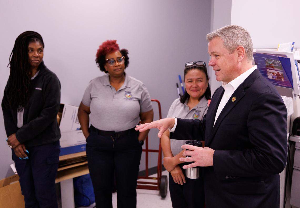 Division of Motor Vehicles Commissioner Paul Tine speaks with employees at the DMV East Raleigh office on Friday, May 9, 2025.