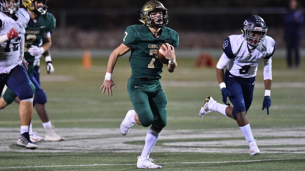Cardinal Gibbons’ Jack Grazen (7) runs for a touchdown. The Cardinal Gibbons Crusaders and the Heritage Huskies met in the NCHSAA 4A second round playoff game in Raleigh, N.C. on November 22, 2019.