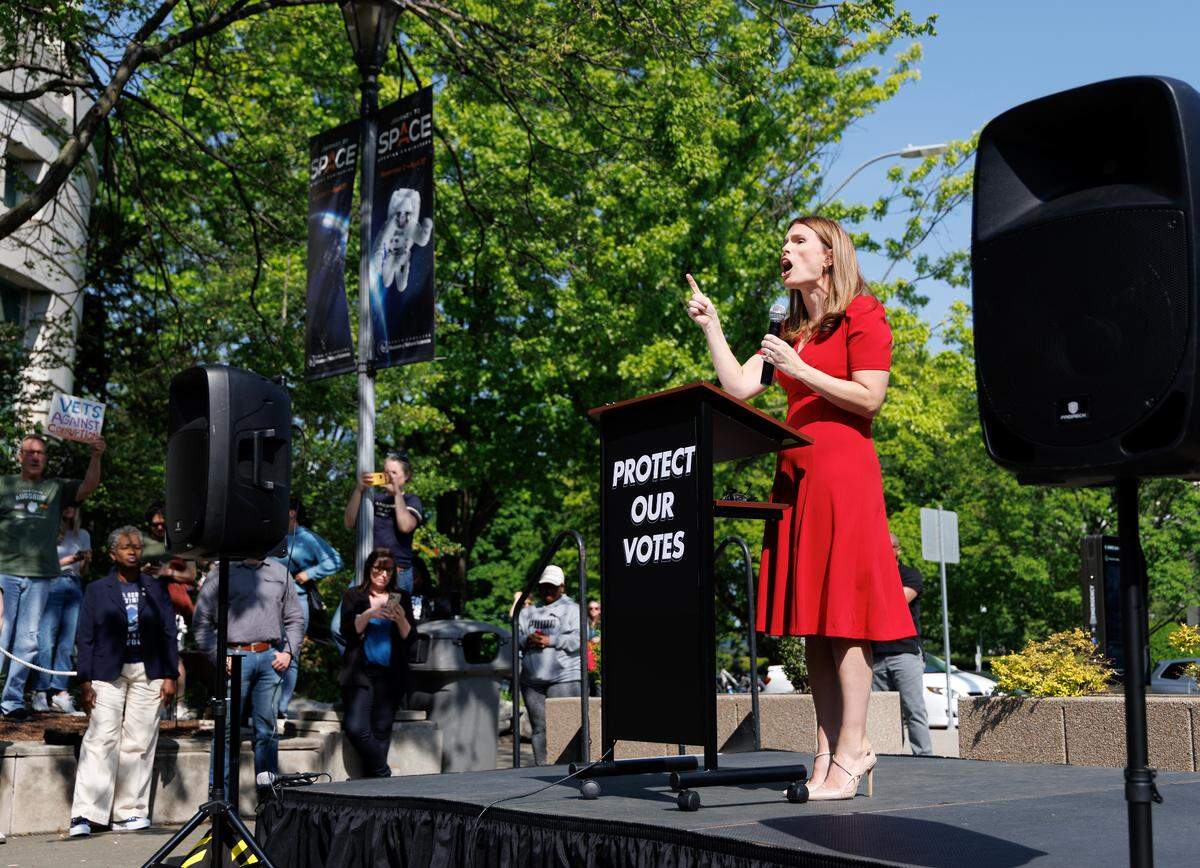 North Carolina Supreme Court Justice Allison Riggs, the Democratic incumbent in November’s election, speaks to supporters during a rally on Monday, April 14, 2025, in Raleigh, N.C. The event protested Republican state Supreme Court candidate Jefferson Griffin’s challenge of 65,000 votes in the election.