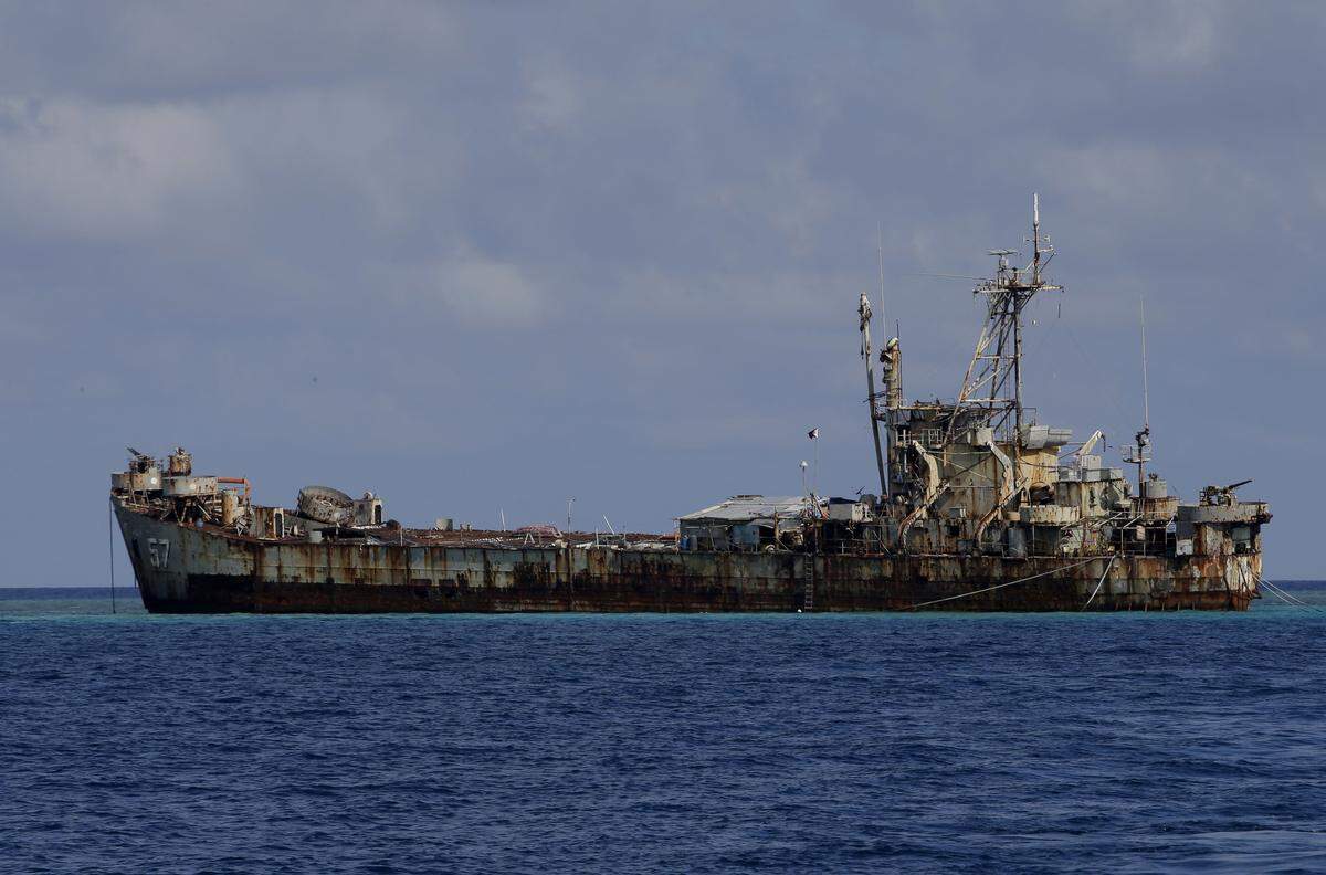 A broadside view of Philippine Navy ship LT57 Sierra Madre in the shallow waters of Second Thomas Shoal in the South China Sea. 