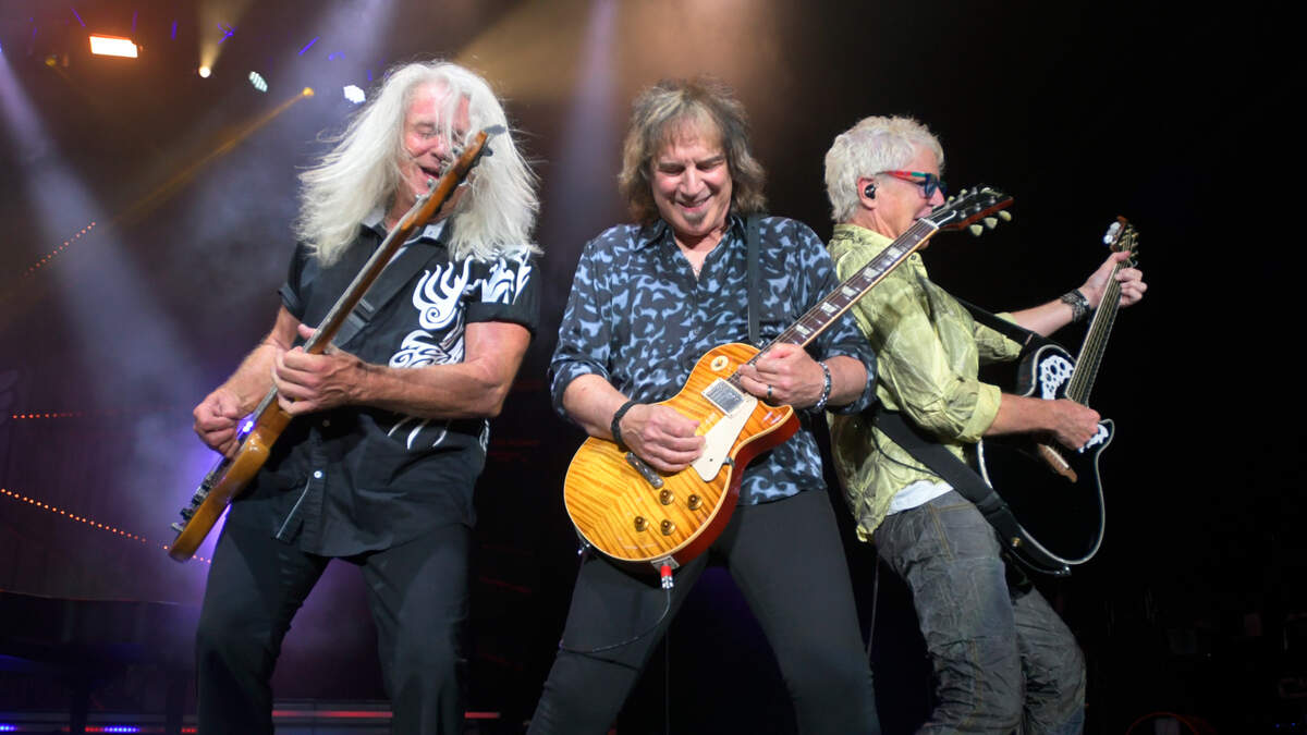 REO Speedwagon’s Bruce Hall (left), Dave Amato (center) and Kevin Cronin in concert at Raleigh, N.C.’s Coastal Credit Union Music Pavilion at Walnut Creek, Wednesday night, Aug. 10, 2022.