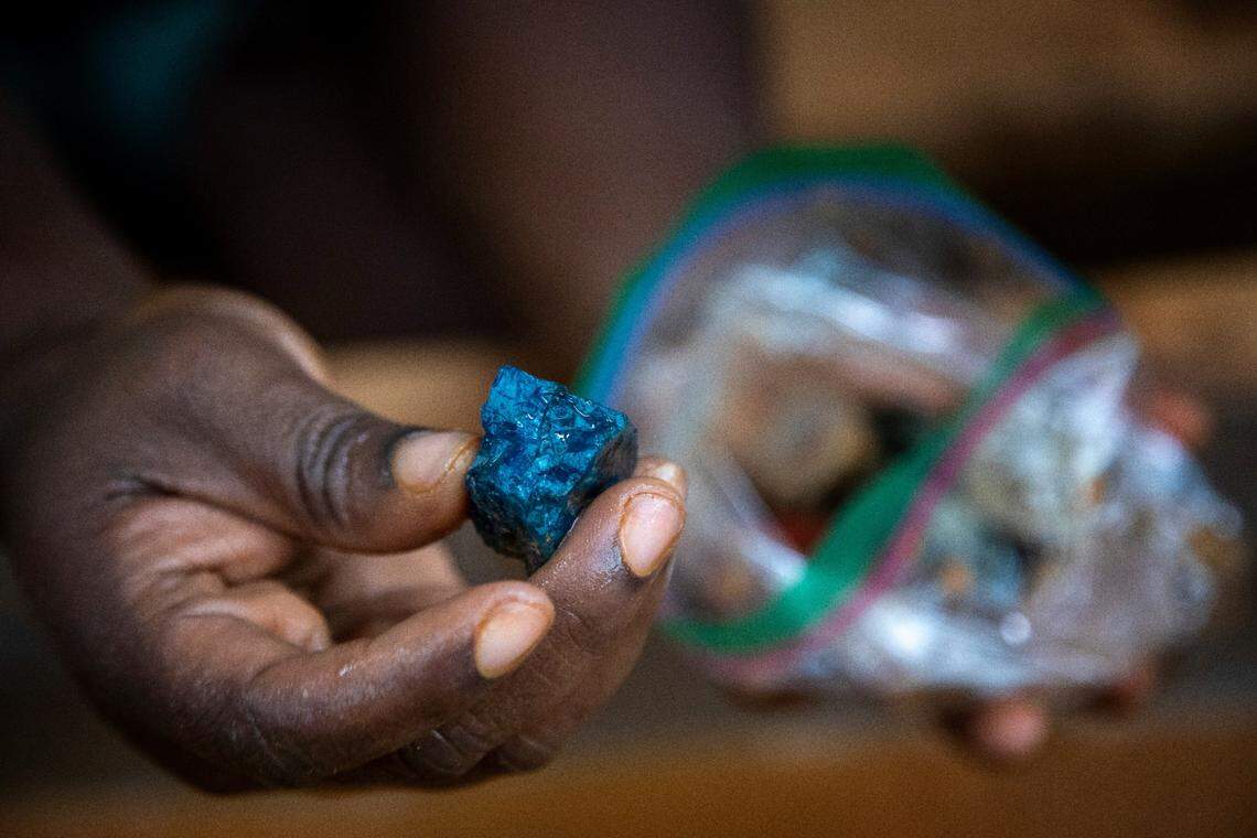 Whittany Bennett shows off one of her finds from the Emerald Hollow Mine in Hiddenite. The mine is billed as “the only Emerald Mine in the world open to the public for prospecting.”