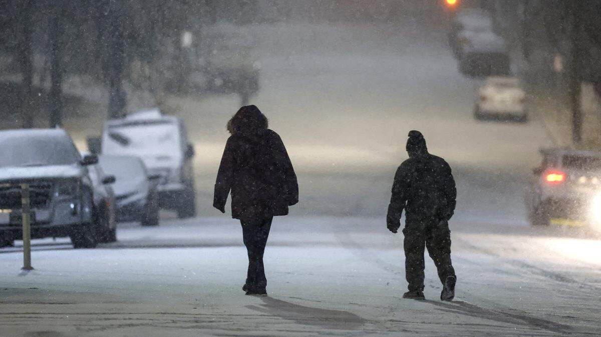 W. North Street in the Glenwood South district in Raleigh is covered in snow Saturday evening, Jan. 31, 2026.