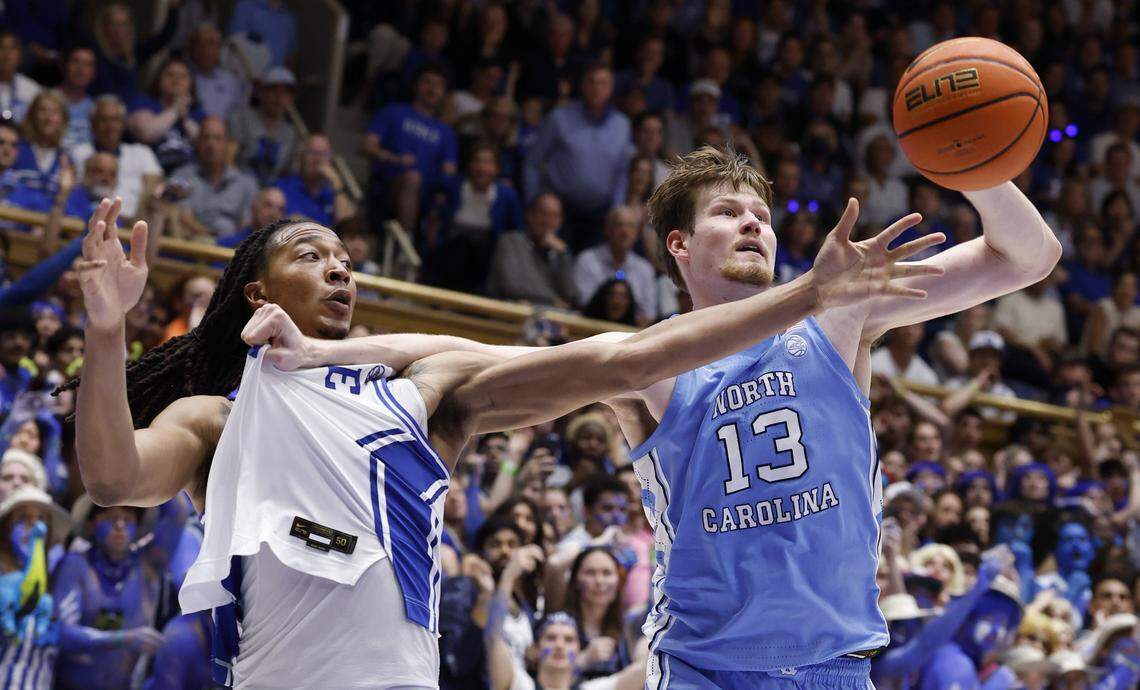 North Carolina's Henri Veesaar (13) keeps Duke’s Maliq Brown (6) from the rebound during the second half of Duke’s 76-61 victory over UNC at Cameron Indoor Stadium in Durham, N.C., Saturday, March 7, 2026.
