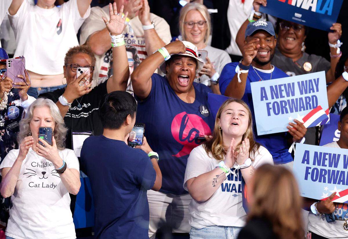 Attendees cheer for Vice President and democratic nominee for president Kamala Harris during a rally at the Greensboro Coliseum in Greensboro, N.C., Thursday, Sept. 12, 2024.