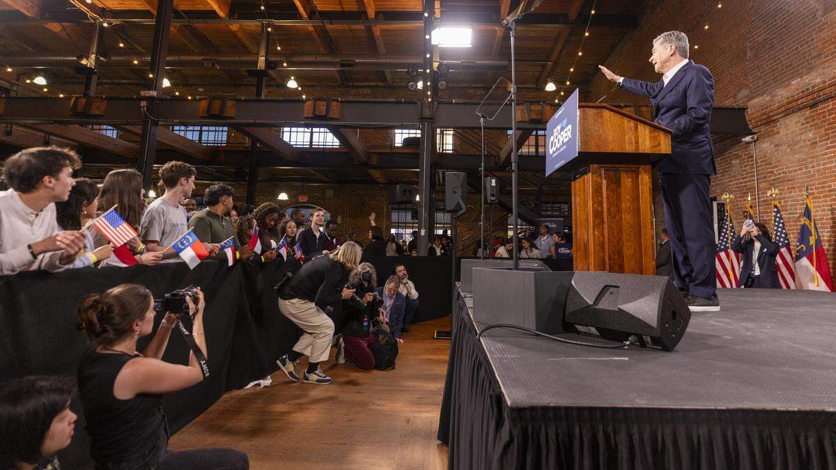 Former Gov. Roy Cooper speaks during a “Make Stuff Cost Less” campaign rally on Thursday, April 9, 2026, at Bay 7 in Durham’s American Tobacco Campus. Cooper faces former Republican National Committee Chairman Michael Whatley in the race for U.S. Senate. Both are vying to replace Sen. Thom Tillis, a Republican from Huntersville, who is retiring at the end of his term.