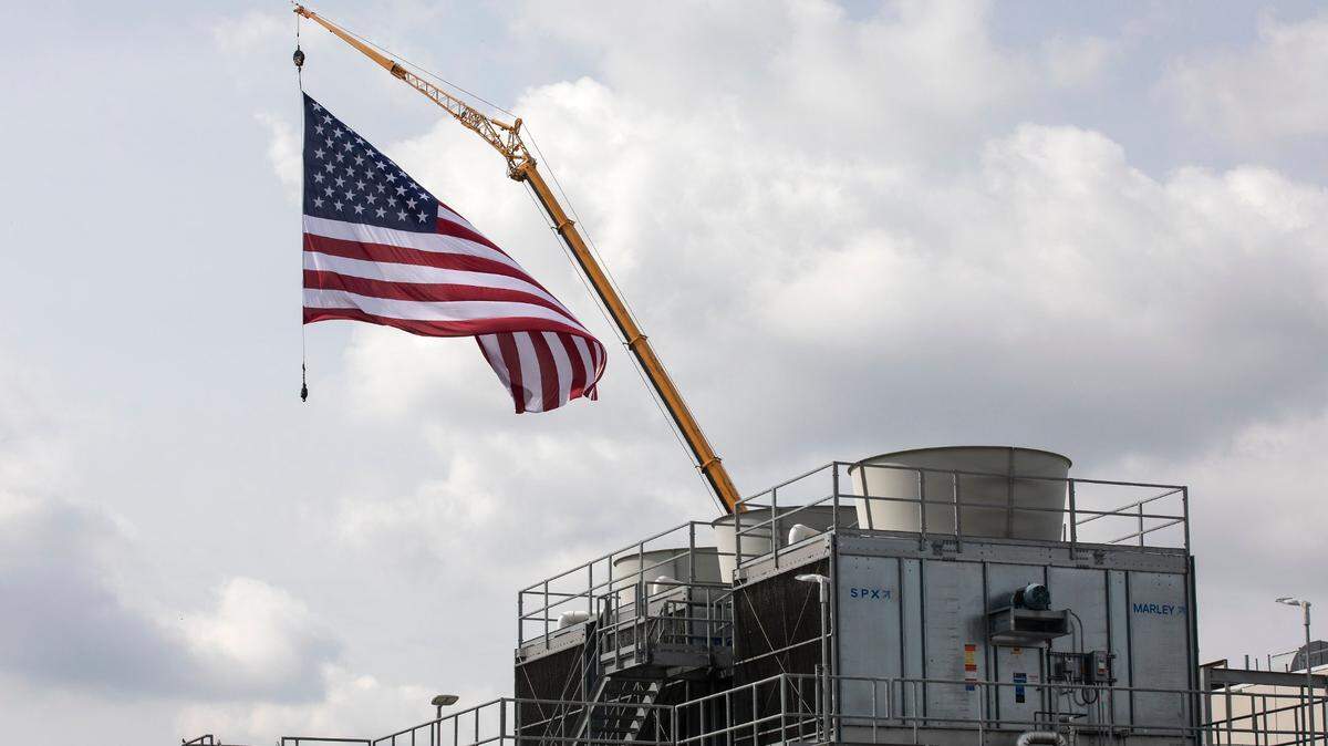 An American flag flies above Wolfspeed prior to a visit by President Joe Biden on Tuesday, March 28, 2023, in Durham, N.C.