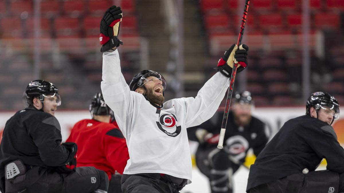Carolina Hurricanes center Jordan Staal (11) rejoices after scoring a goal on one knee, from center ice, during practice on Tuesday, May 12, 2026, at Lenovo Center in Raleigh, N.C.