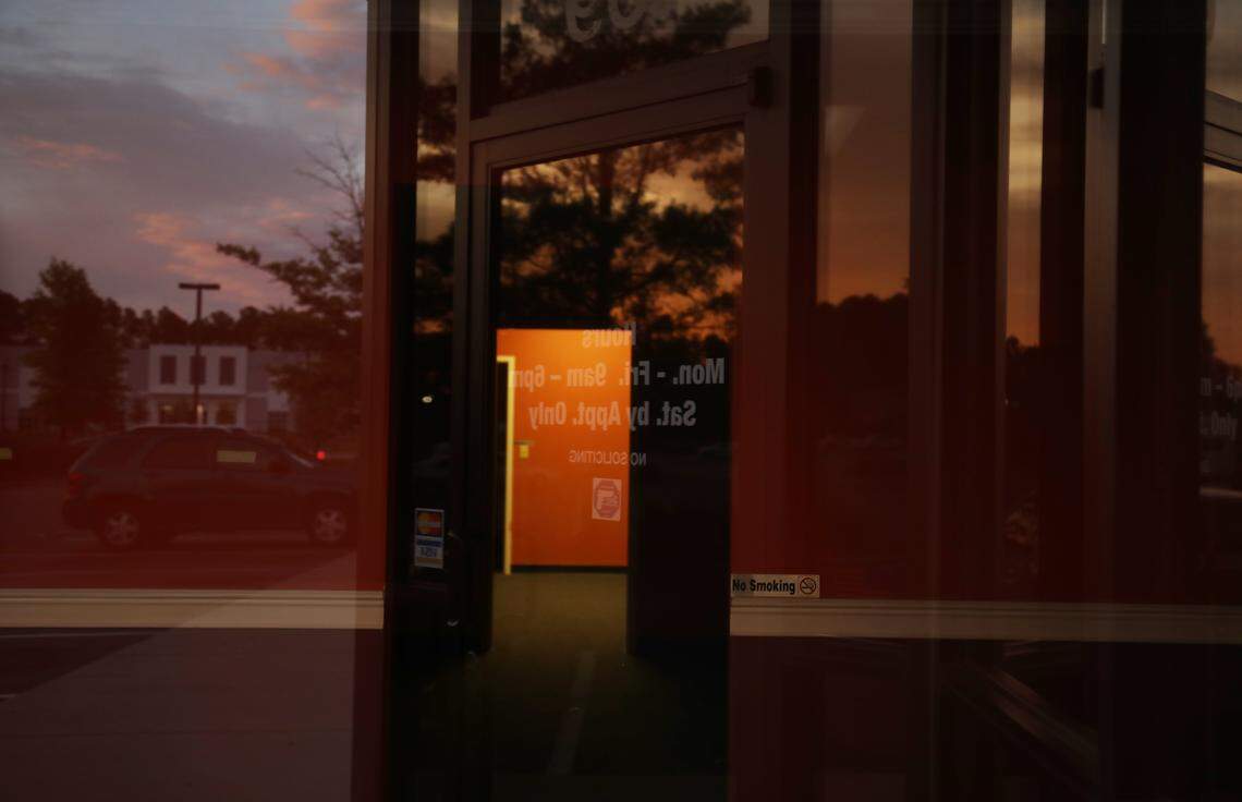 A long hall remains lit in the vacated Neon Moon Spa, an illicit massage business, tucked away in a busy Durham strip mall. The Durham County SheriffÕs Office recently charged the manager, Lian Jin Xu, with promoting prostitution and released the three employees who are believed to be human-trafficking victims.
