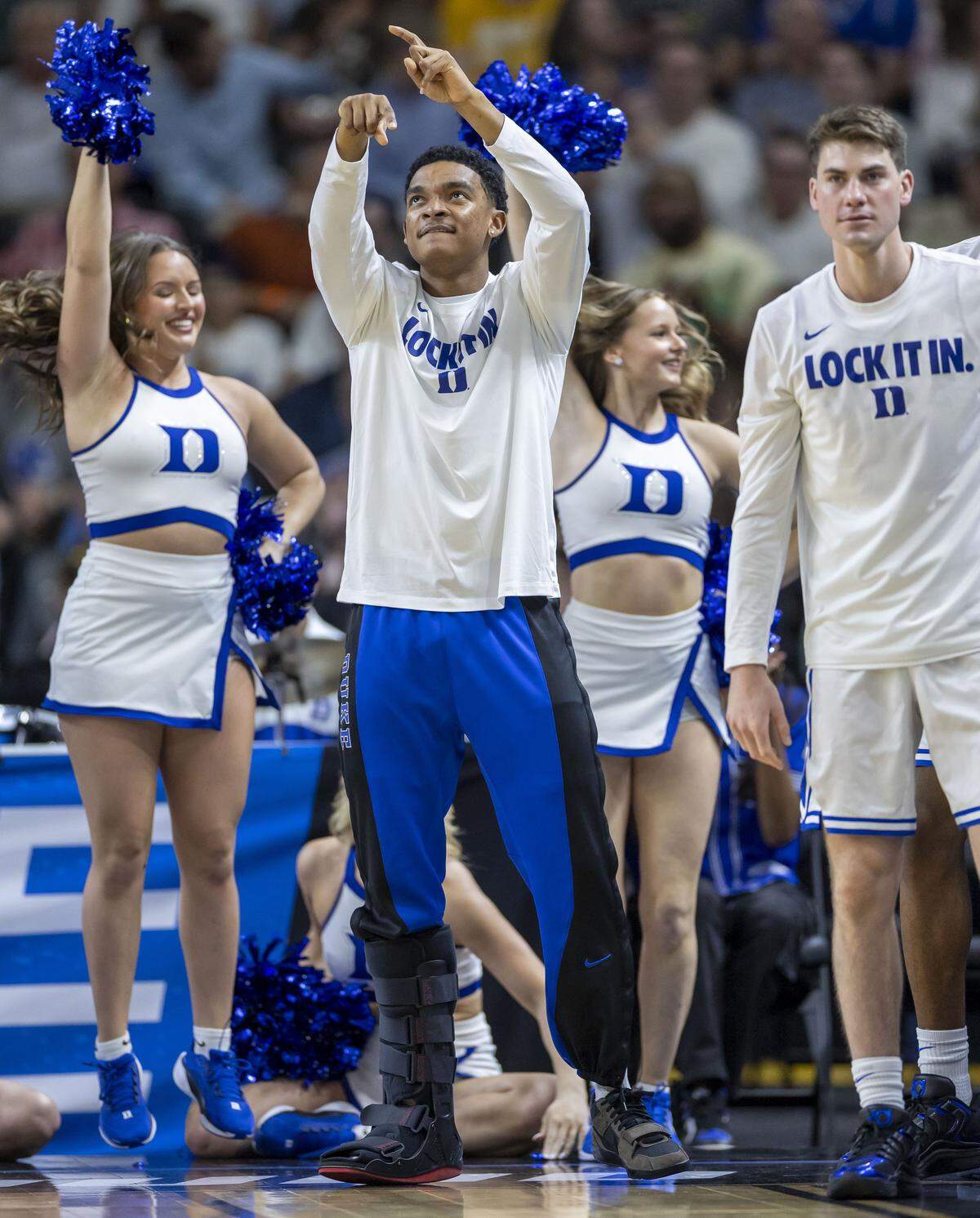 Duke guard Caleb Foster (1), out with an injury, celebrates a lead by the Blue Devils in the first half against TCU on Saturday, March 21, 2026, during the second round of the NCAA Tournament at Bon Secours Arena in Greenville, S.C.