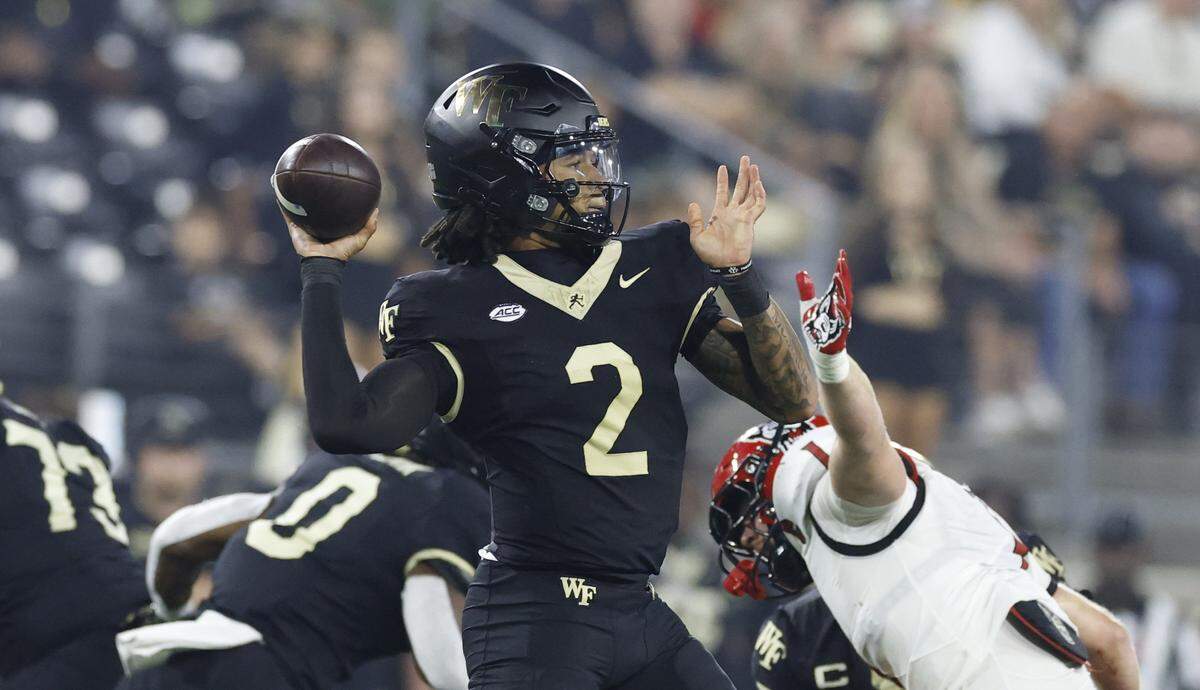 Wake Forest quarterback Robby Ashford (2) throws during the first half of N.C. State’s game against Wake Forest at Allegacy Stadium in Winston-Salem, N.C., Thursday, Sept. 11, 2025.