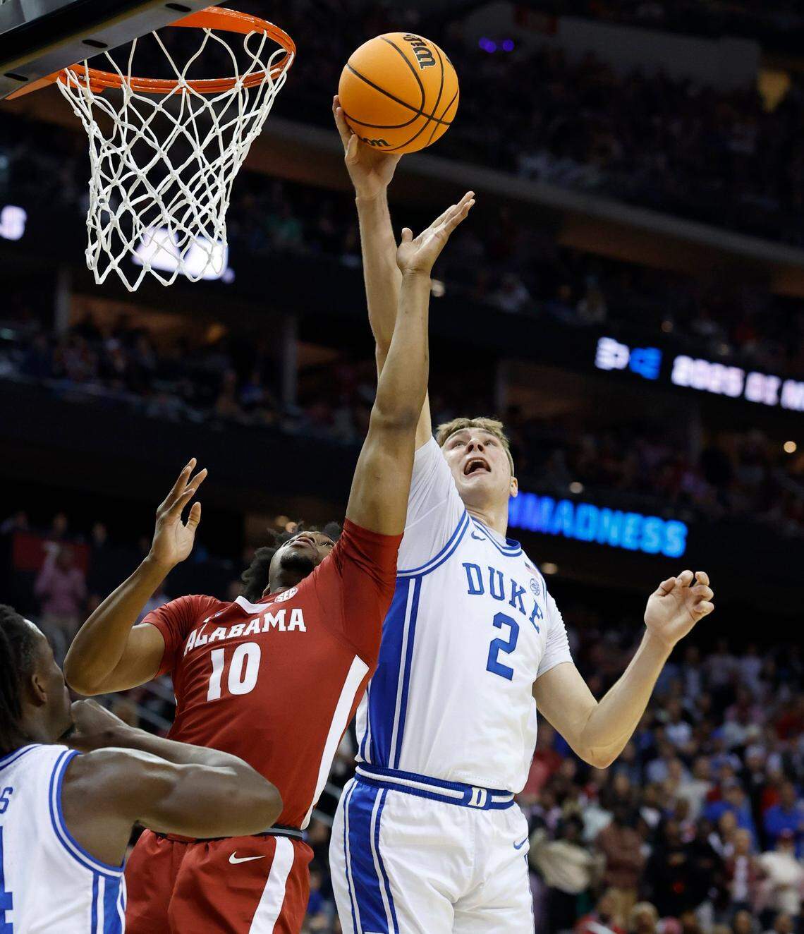 Duke’s Cooper Flagg (2) blocks the shot by Alabama’s Mouhamed Dioubate (10) during the first half of Duke’s game against Alabama in their Elite 8 game in the 2025 NCAA Men’s Basketball Championship at the Prudential Center in Newark, N.J., Saturday, March 29, 2025.