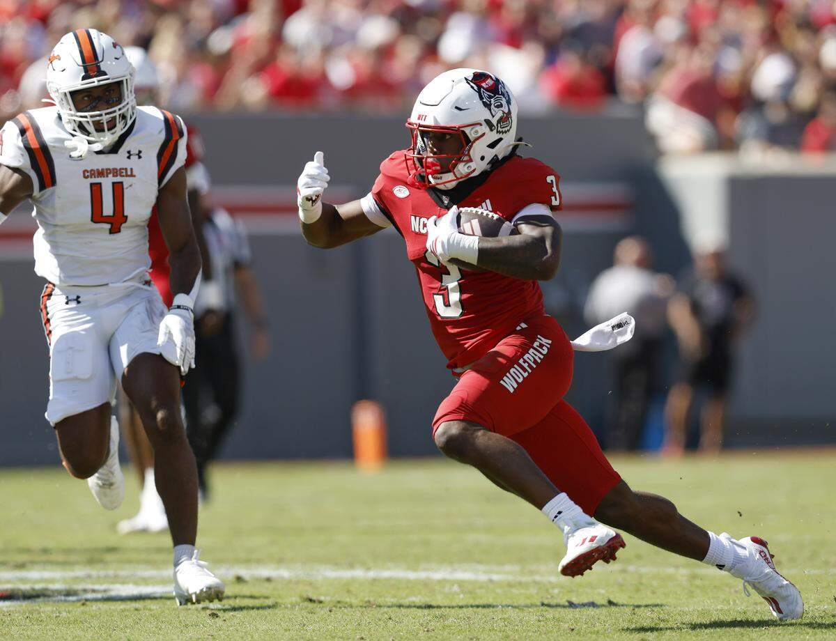 N.C. State’s Hollywood Smothers runs the ball during the first half of the Wolfpack’s game against Campbell on Saturday, Oct. 4, 2025, at Carter-Finley Stadium in Raleigh, N.C.
