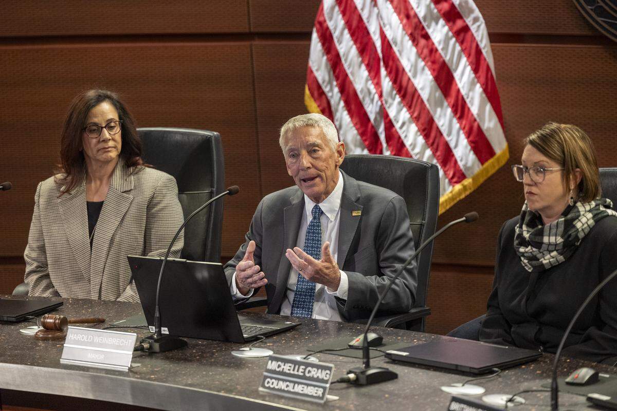 Cary Mayor Harold Weinbrecht, center, leads an emergency Cary Town Council meeting Monday, Dec. 15, 2025, at Cary Town Hall. Weinbrecht said Town of Cary Manager Sean Stegall had been placed on leave for excessive spending, a lack of transparency and an unhealthy work environment. Stegall resigned over the weekend.