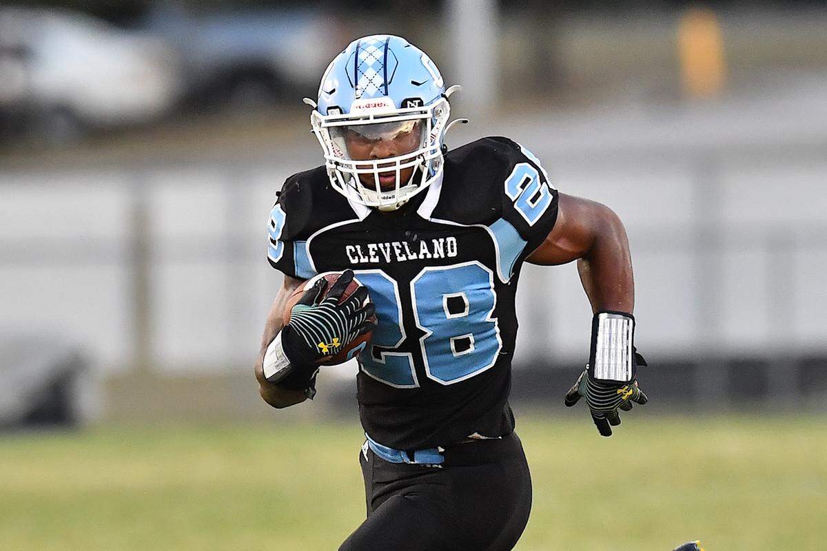 Cleveland’s Omarion Hampton runs for yardage and the touchdown during he first quarter.The Cleveland Rams and the Corinth Holders Pirates met in a football game in Clayton, N.C. on September 17, 2021.