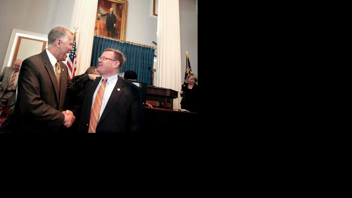 "Good job today," says Representative Tim Moore (Rep), right, to Speaker of the House Thom Tillis (Rep), left, after their session adjourned. Members of the N.C. House met in the old chambers in the N.C. State Capitol in Raleigh, N.C. on Thursday, May 22, 2014. They gathered in the historic room to celebrate its 220th anniversary. The space served the 120-member House of Commons from 1840-1868 and the House of Representatives from 1868-1961.
