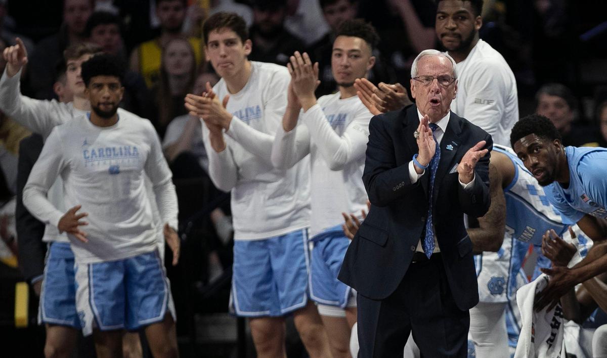 North Carolina coach Roy Williams and the Tar Heels’ bench applaud the starters performance during the first half against Wake Forest on Saturday, February 16, 2019 at Lawrence Joel Coliseum in Winston-Salem, N.C.