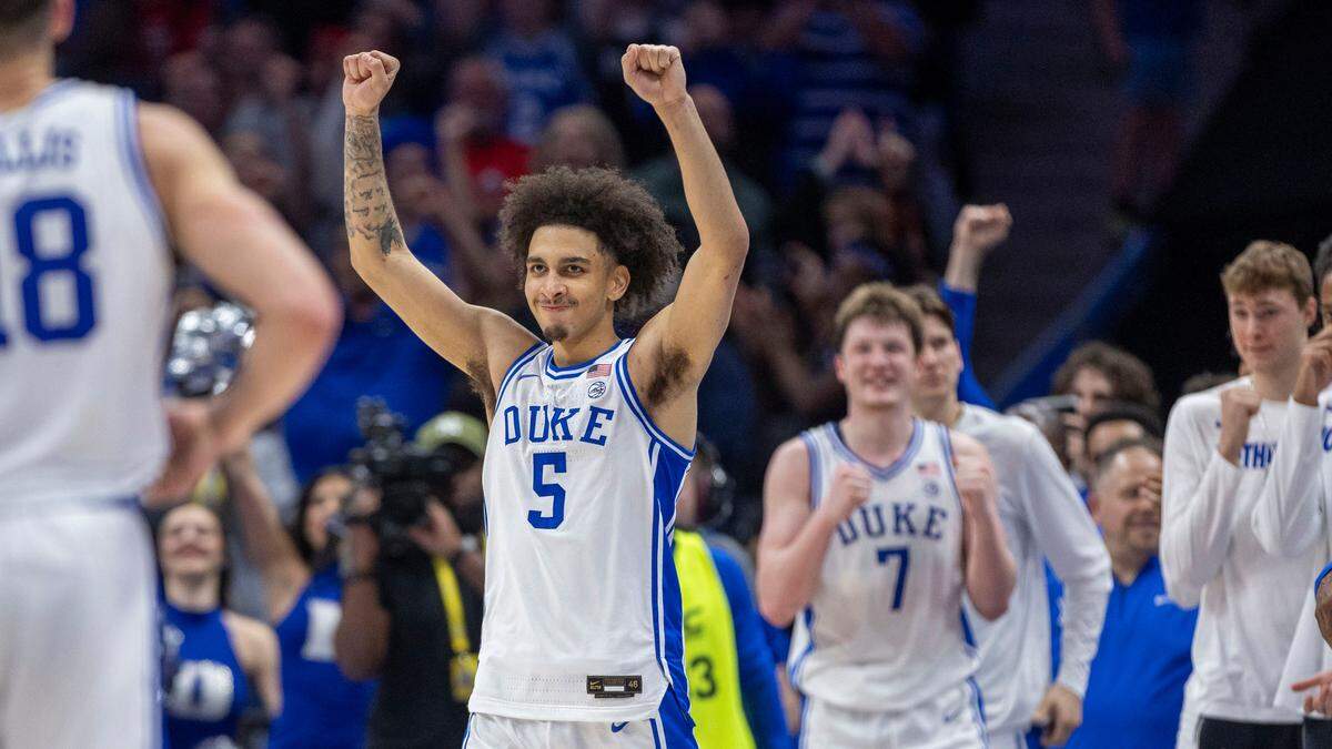 Duke’s Tyrese Proctor (5) celebrates the Blue Devils’ 73-62 victory over Louisville in the ACC Tournament Championship game on Saturday, March 15, 2025 at Spectrum Center in Charlotte, N.C.