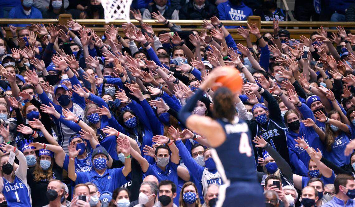 Fans try to make Virginia’s Armaan Franklin (4) miss his free throw during the first half of Dukes game against Virginia at Cameron Indoor Stadium in Durham, N.C., Monday, Feb. 7, 2022.