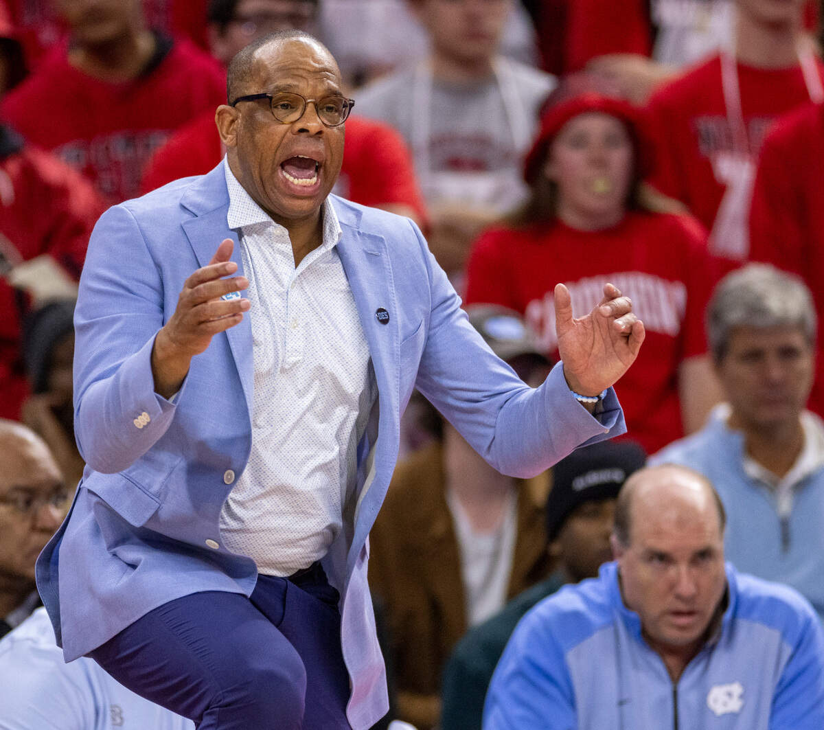 North Carolina coach Hubert Davis directs his team on defense in the first half against N.C. State on Wednesday, January 10, 2024 at PNC Arena in Raleigh, N.C.