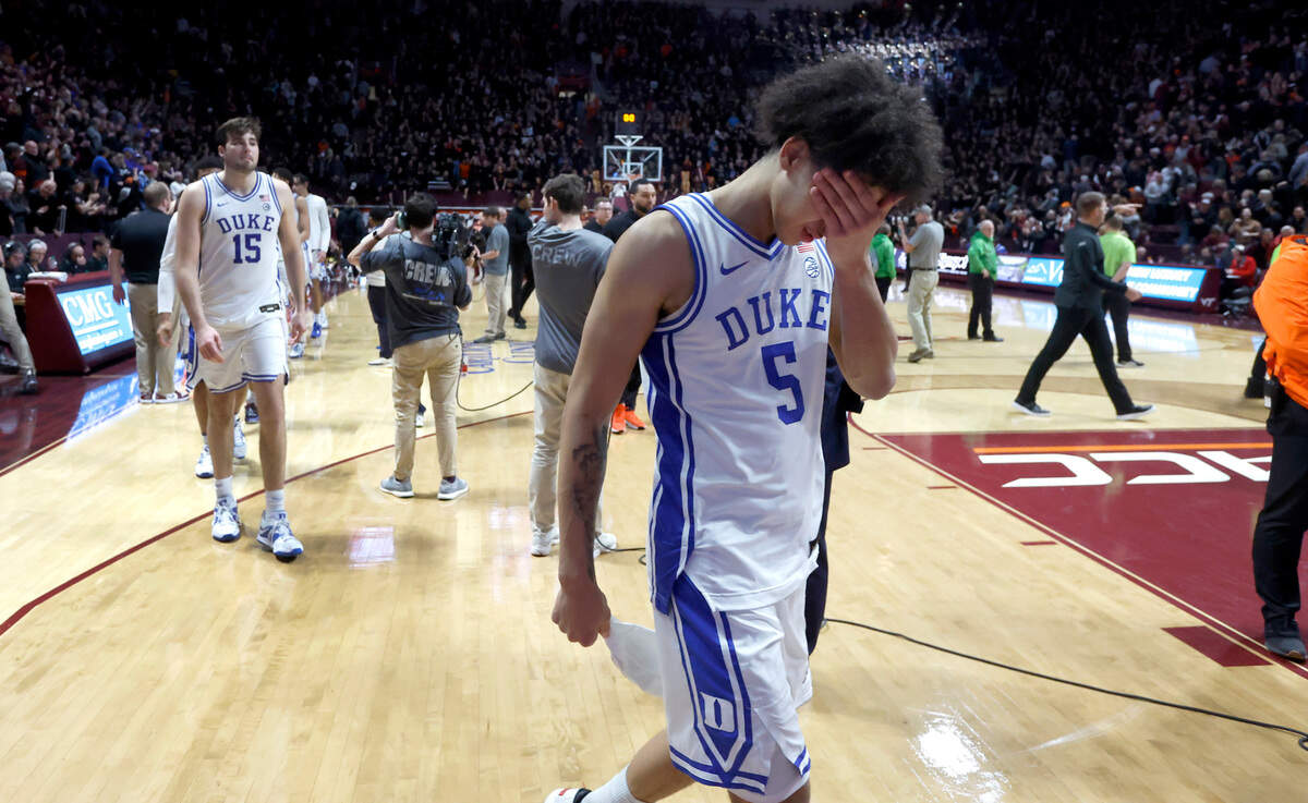 Duke’s Tyrese Proctor (5) and the team walk off the court after Virginia Tech’s 78-75 victory over Duke at Cassell Coliseum in Blacksburg, VA., Monday, Jan. 23, 2023.