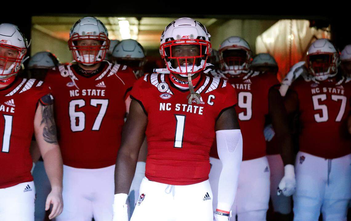 N.C. State linebacker Isaiah Moore (1) prepares to lead teammates out to the field to warm up before N.C. State’s game against Wake Forest at Carter-Finley Stadium in Raleigh, N.C, Saturday, Sept. 19, 2020.