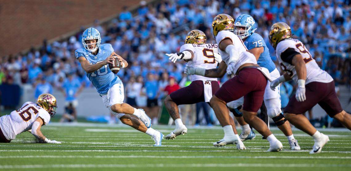 Minnesota’s Devon Williams (9) and the defense flushes North Carolina quarterback Drake Maye out of the pocket in the third quarter on Saturday, September 16, 2023 at Kenan Stadium in Chapel Hill N.C.