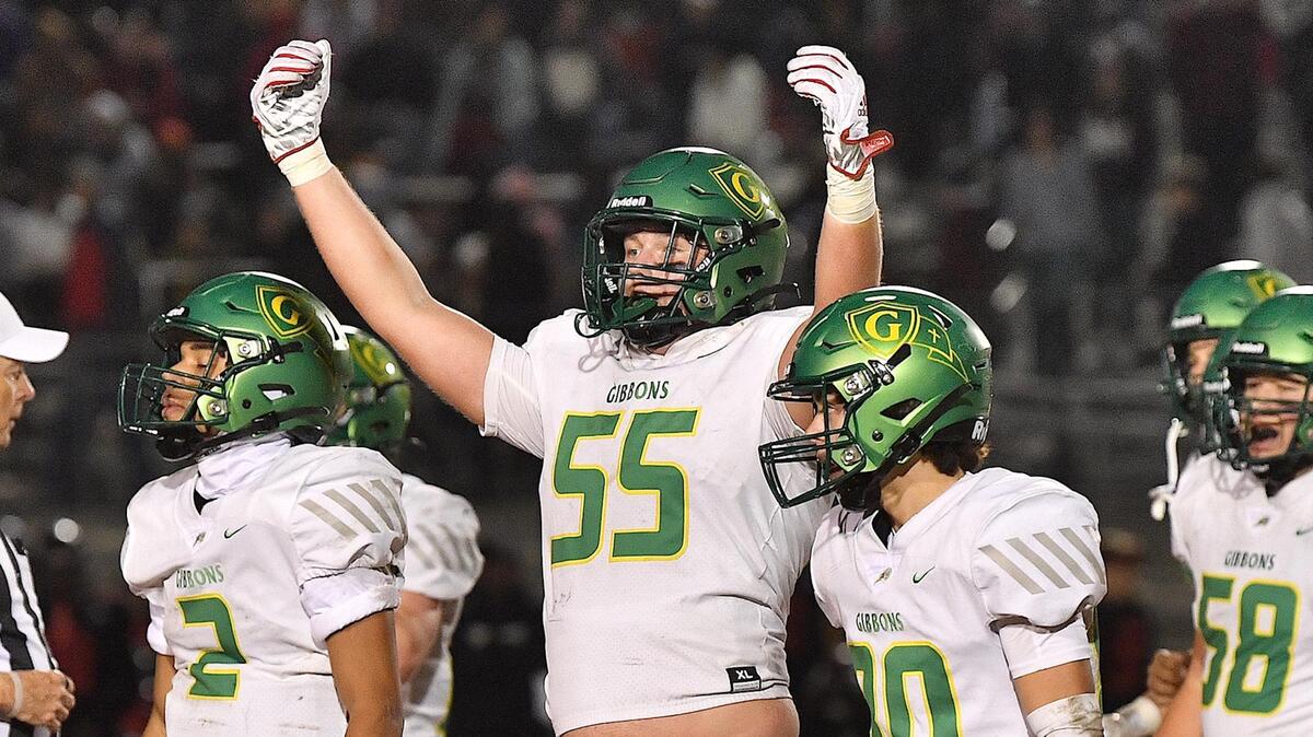 Cardinal Gibbons’ Connor Doeren (55) celebrates the impending victory over Rolesville in the final moments the NCHSAA 4A Playoffs. The Rolesville Rams and the Cardinal Gibbons Crusaders met in the fourth round of the NCHSAA 4A Football Playoffs in Raleigh, N.C. on November 24, 2023.