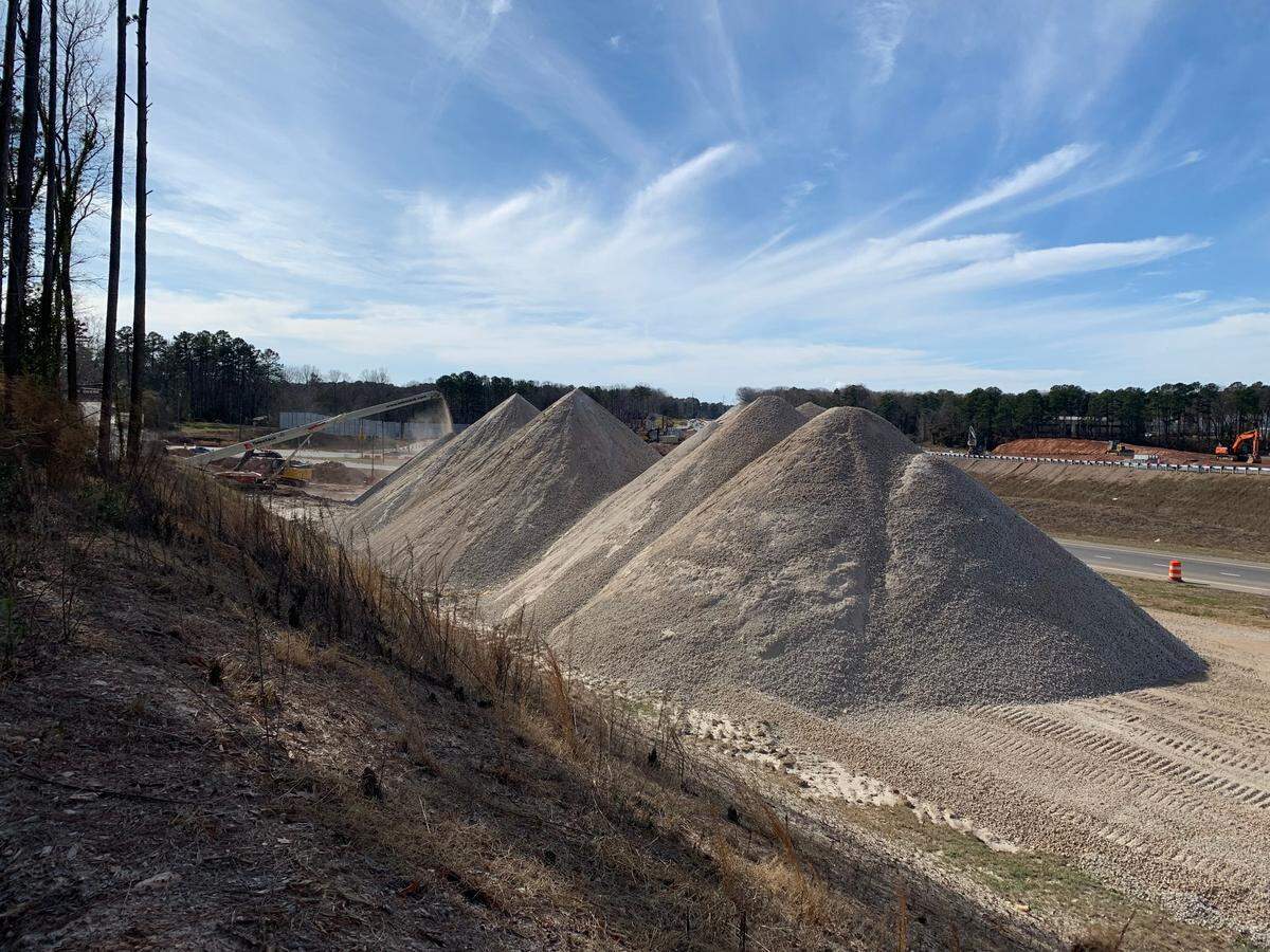 Piles of crushed concrete at the Western Boulevard interchange with the Raleigh Beltline will be used as fill as the highway is widened and rebuilt.